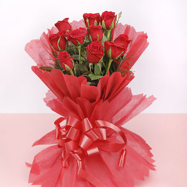 Red Roses in Red Paper Packing