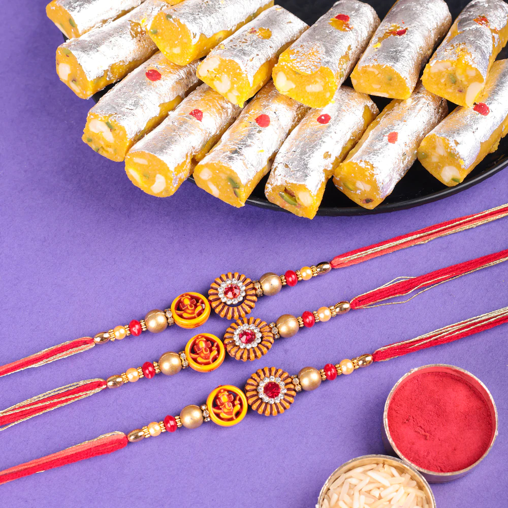 Red Stone Set Of 3 Rakhi With Kaju Roll